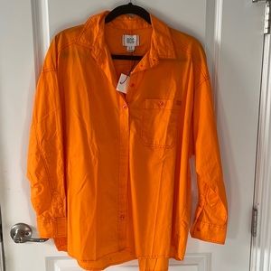 Orange button down shirt
